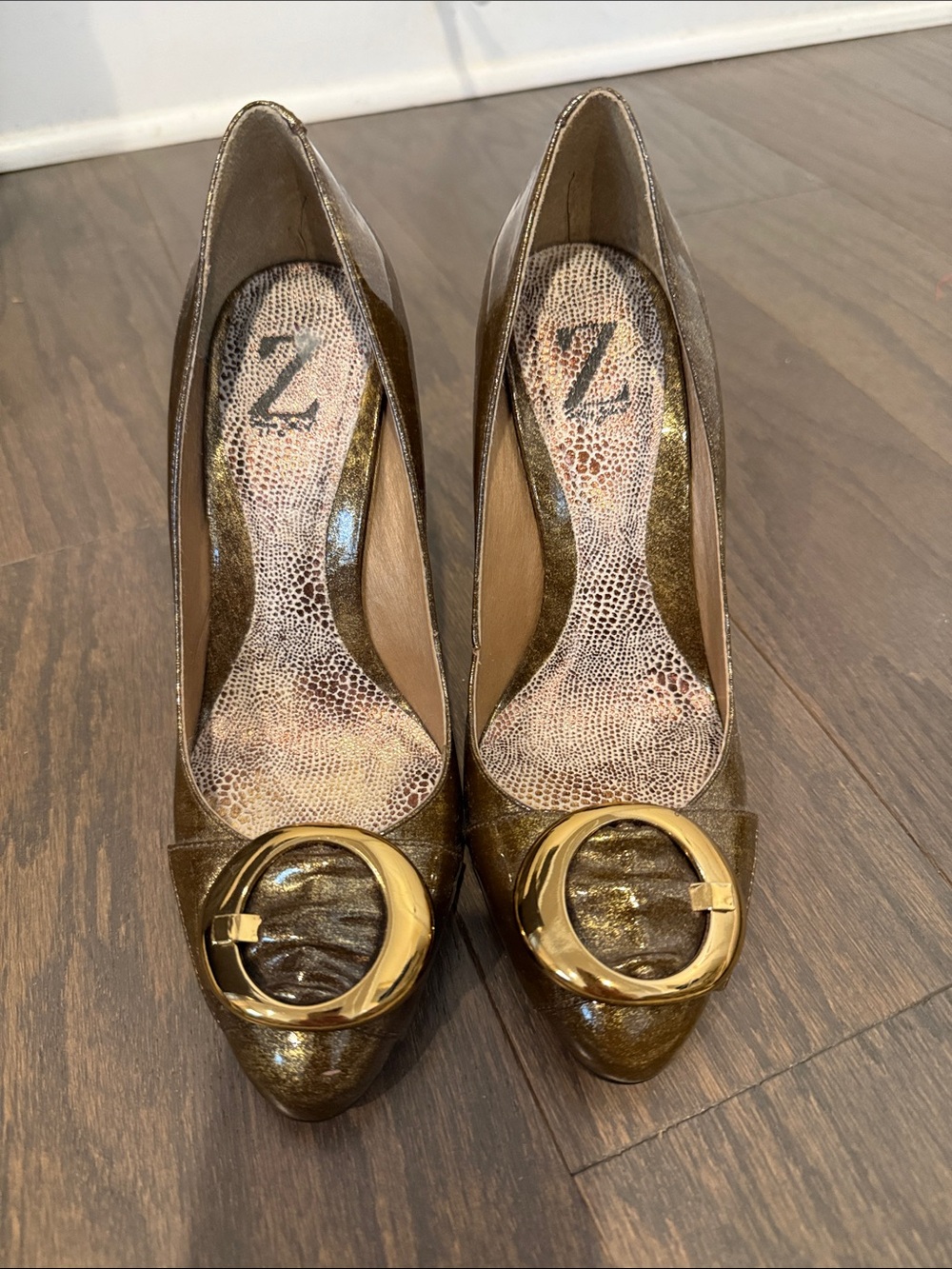 Sergio Zelcer Metallic Bronze Pointed Pumps with Gold Round Buckle
